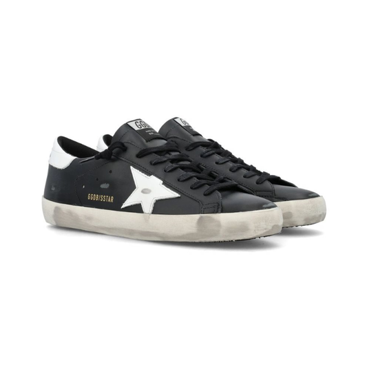 Golden Goose Super-Star glitter black with a silver star