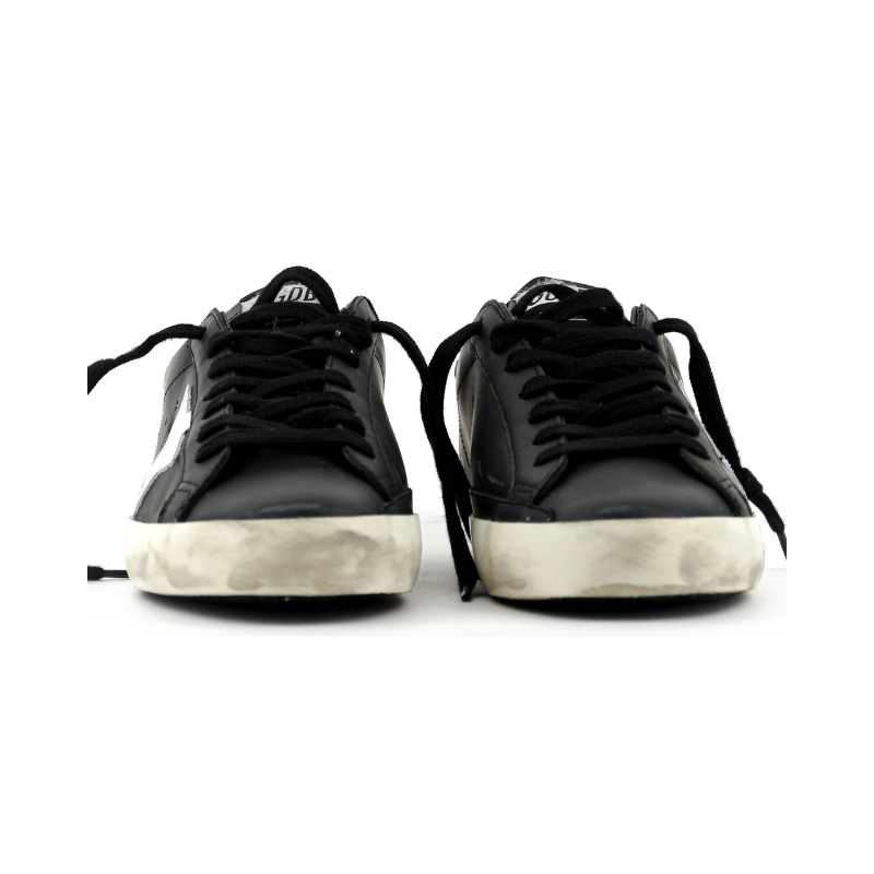 Golden Goose Super-Star glitter black with a silver star